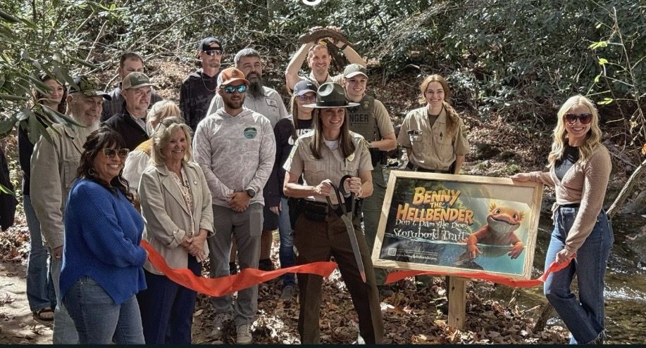 Roan Mountain State Park staff at Storybook Trail ribbon cutting for ‘Benny the Hellbender’ giant storybook